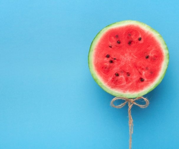 watermelon-balloon-on-blue-background-creative-57PNH8Q