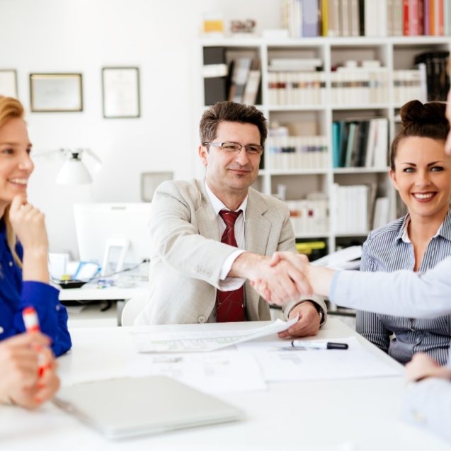 group-of-business-people-working-as-team-in-9HPC4DK