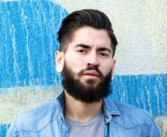 modern-man-standing-outdoors-alone-PHCKVDN