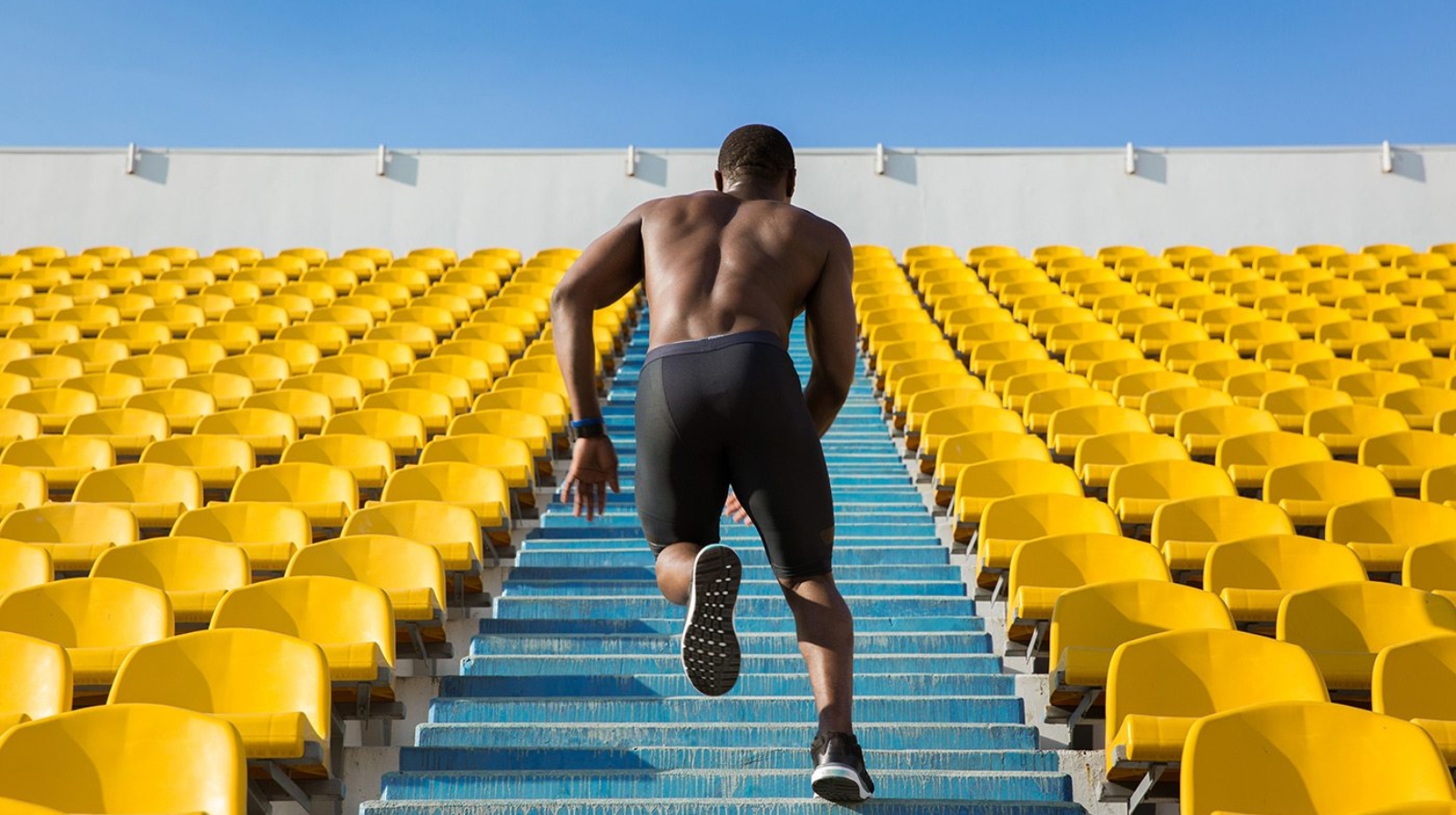 back-view-of-a-sportsman-doing-speed-exercise-for-PVL7ZLA
