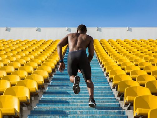 back-view-of-a-sportsman-doing-speed-exercise-for-PVL7ZLA