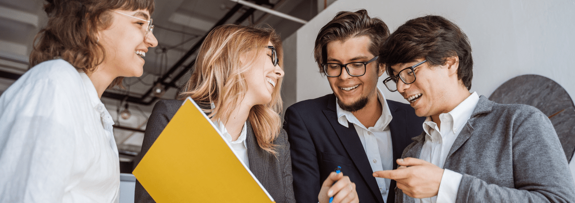group-inspired-young-people-standing-discussing-new-project 2