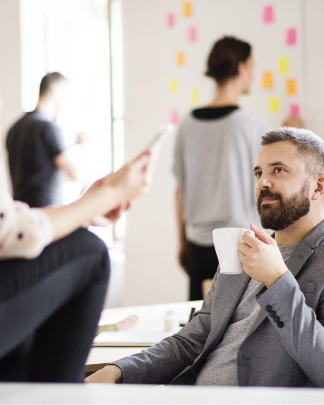 business-people-with-wheelchair-in-the-office-P9M4RX3