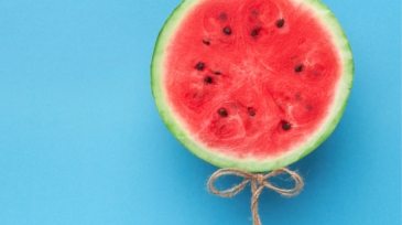 watermelon-balloon-on-blue-background-creative-57PNH8Q