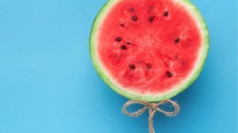 watermelon-balloon-on-blue-background-creative-57PNH8Q
