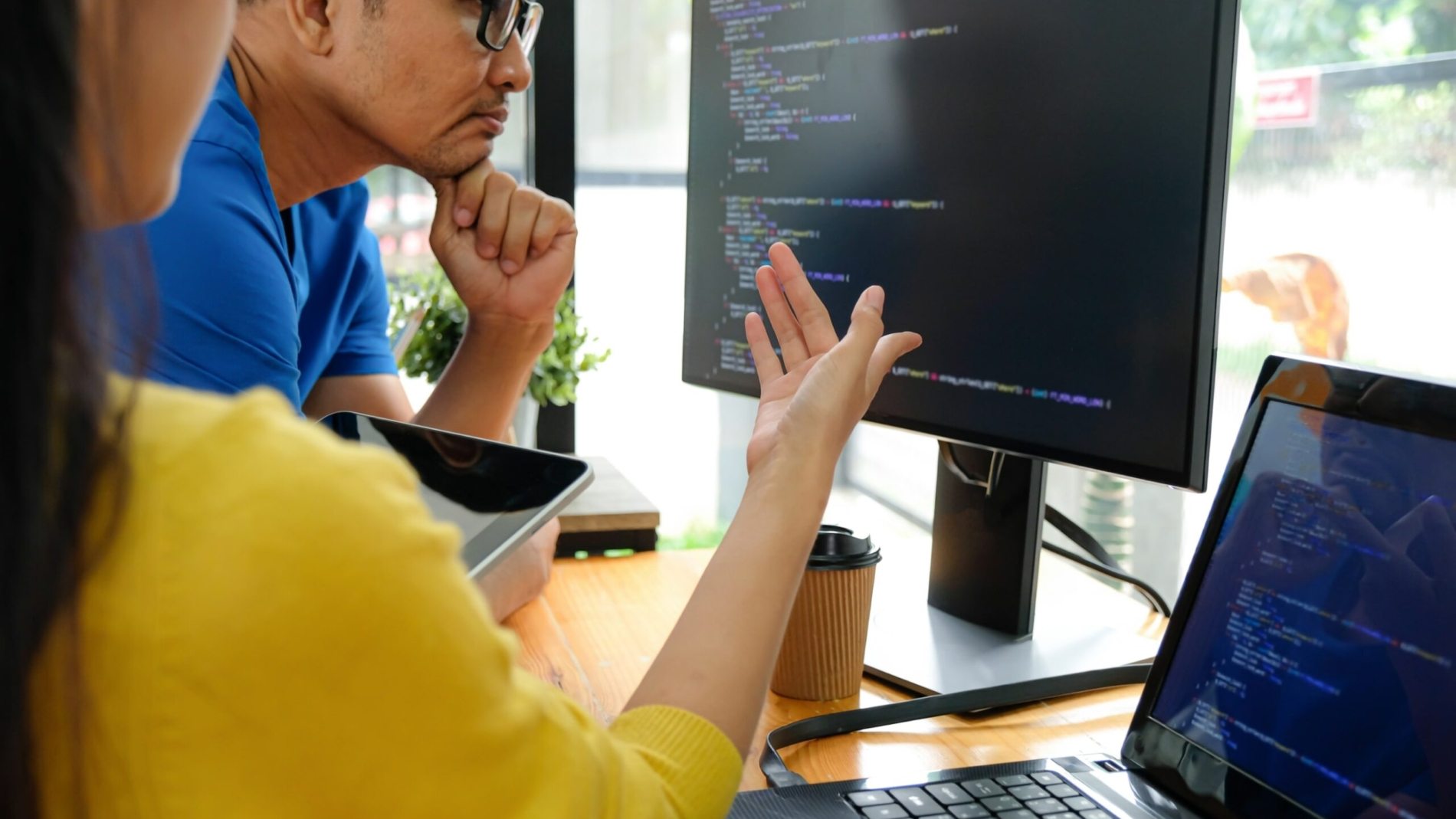 asian-female-programmers-are-pointing-at-their-7NDKJGM-min