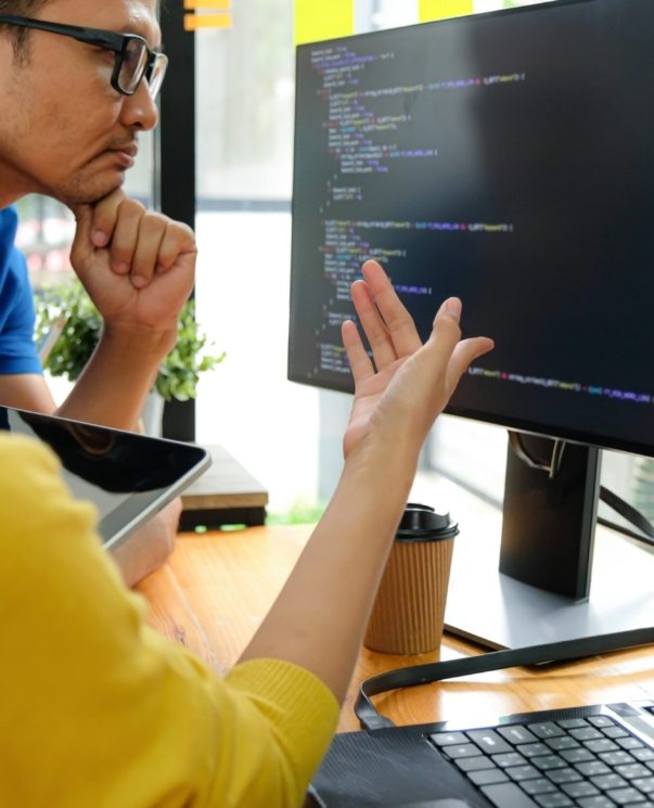 asian-female-programmers-are-pointing-at-their-7NDKJGM-min