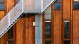 Escape stairs on a modern sustainable wooden office facade