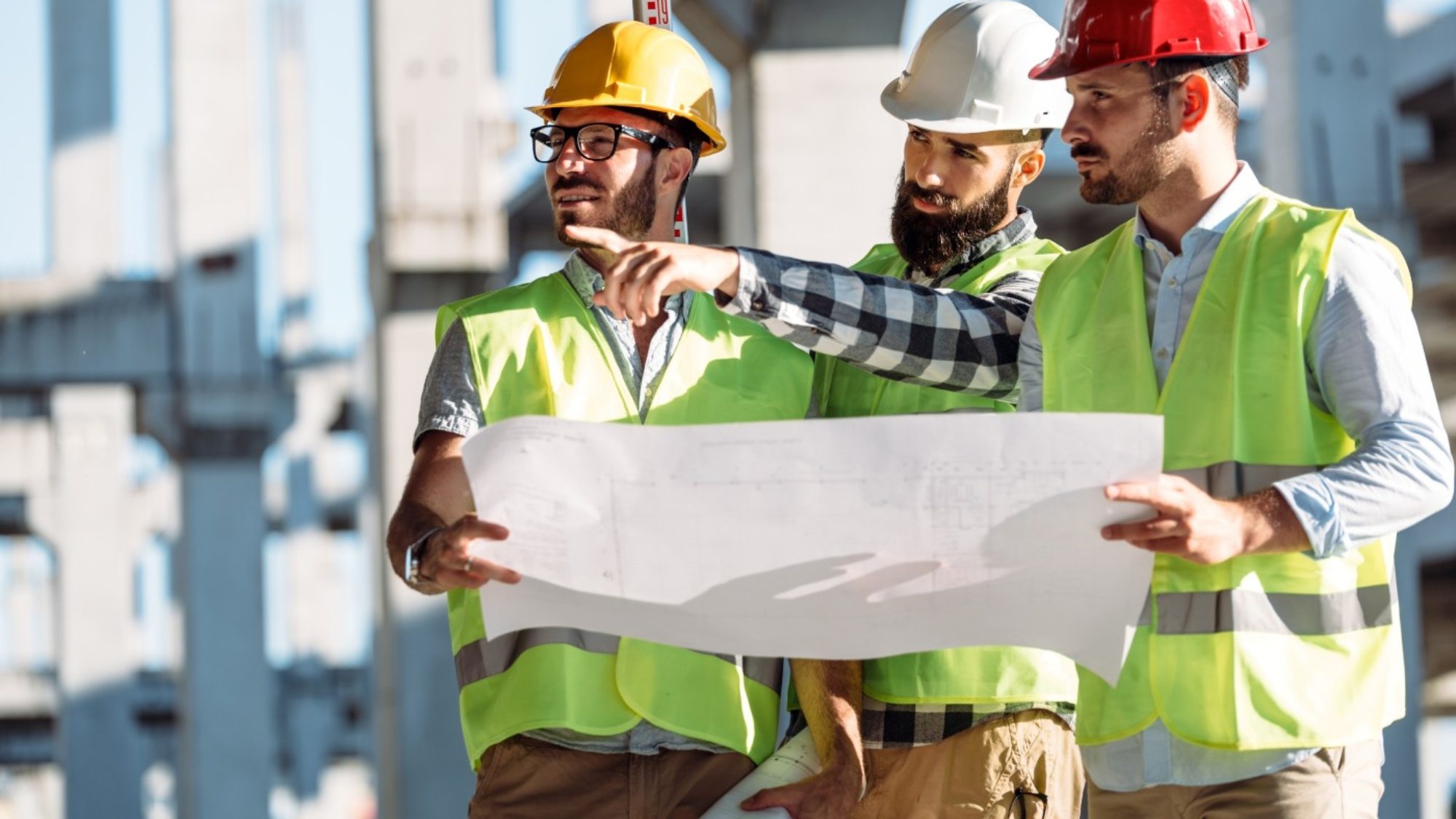 portrait-of-construction-engineers-working-on-J9KU7NC