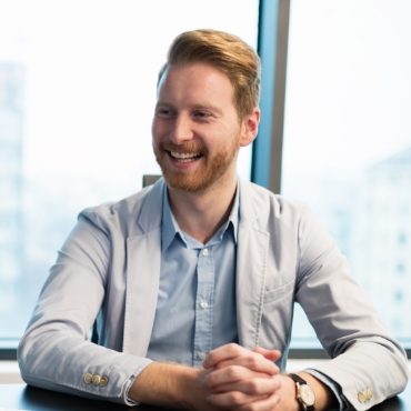 businessman-at-his-working-desk-in-office-37JP45F