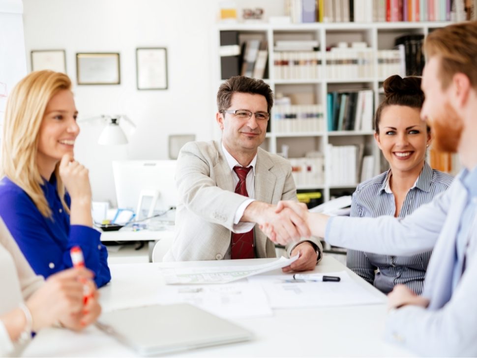 group-of-business-people-working-as-team-in-9HPC4DK