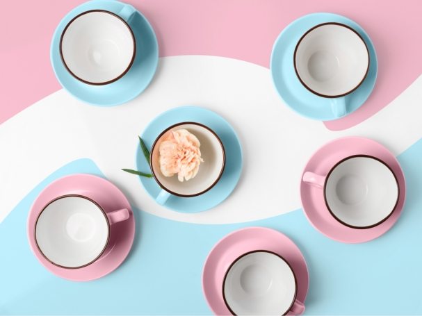 elegant-porcelain-blue-and-pink-cups-on-abstract-PRAGU4T