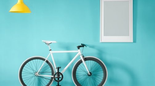 white-bike-in-blue-interior-PMNFYVU