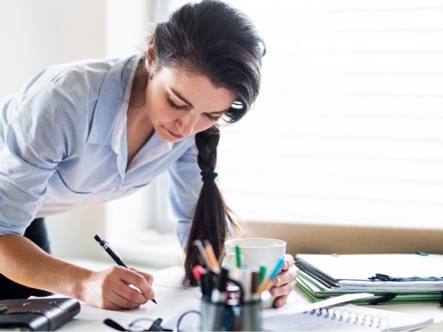 a-portrait-of-a-woman-working-at-home-PW6FL9X