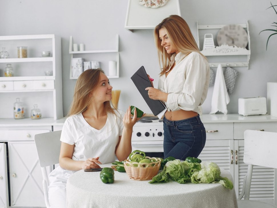 Healthy eating. Dieting and people concept. Blonde with a vegetable.