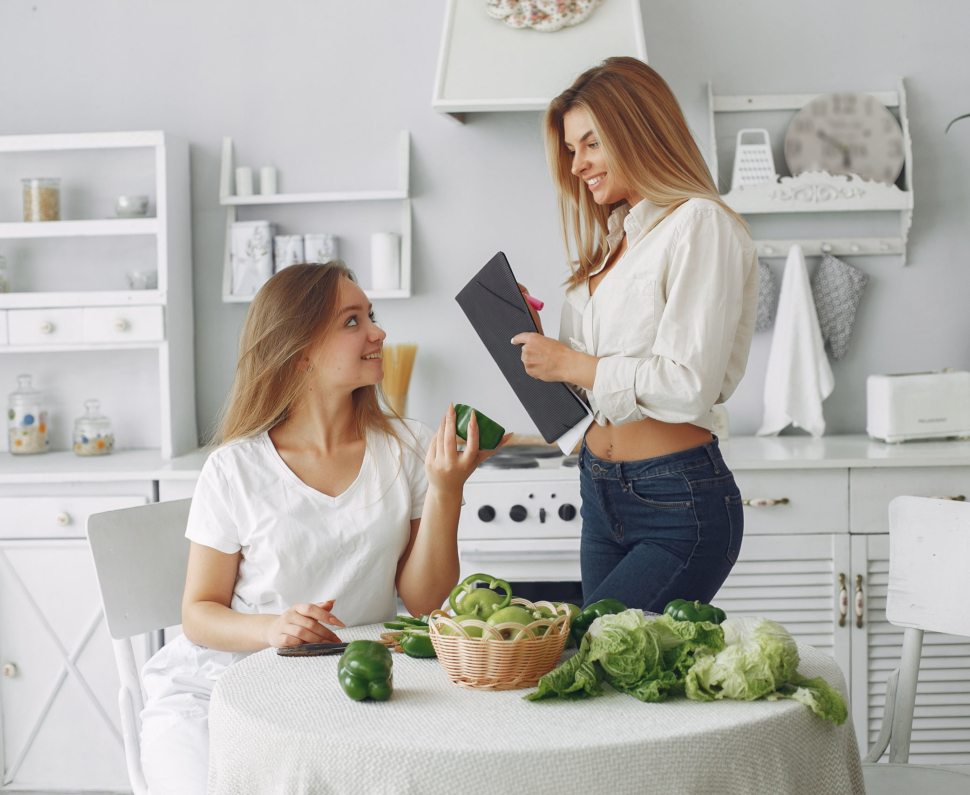 Healthy eating. Dieting and people concept. Blonde with a vegetable.