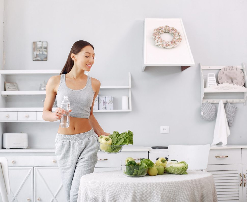 Healthy eating. Dieting and people concept. Brunette with a vegetable.
