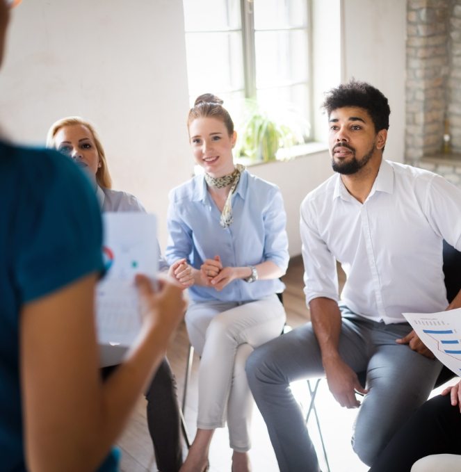 happy-creative-team-in-office-business-startup-ASYDGB7