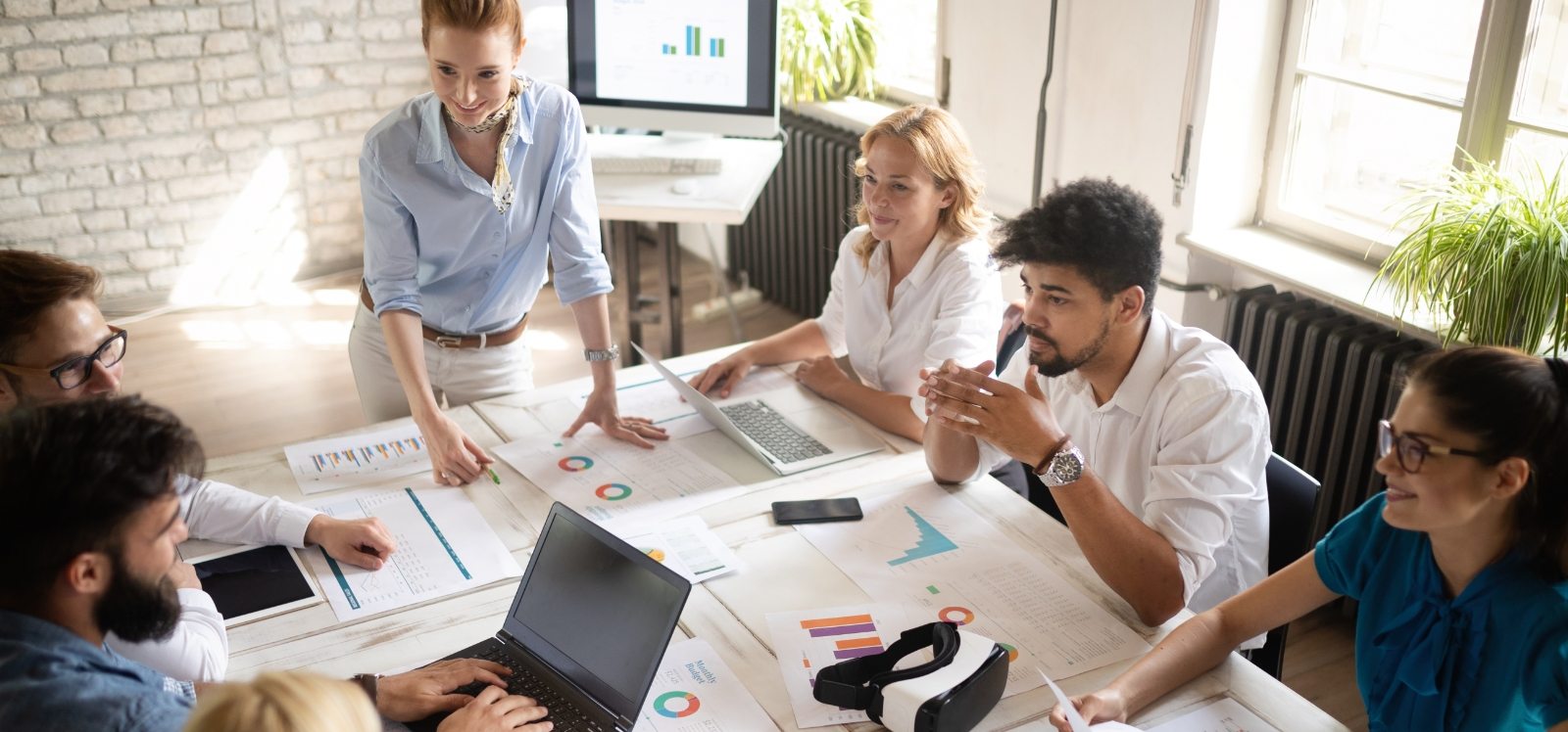happy-creative-team-in-office-business-startup-73ZC9YM