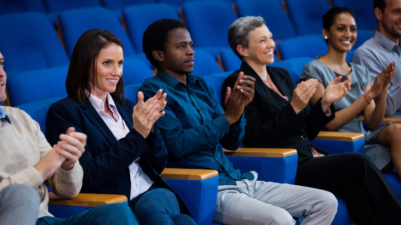 business-executives-applauding-business-meeting