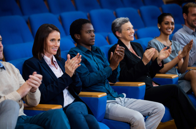 business-executives-applauding-business-meeting