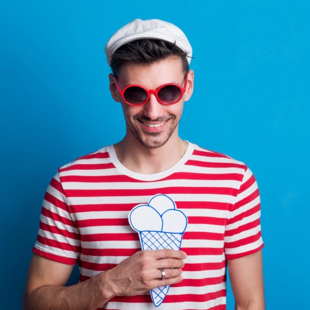 portrait-of-a-young-man-in-a-studio-with-6UQBNFM