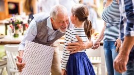 family-celebration-or-a-garden-party-outside-in-PVHU9JN