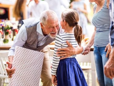 family-celebration-or-a-garden-party-outside-in-PVHU9JN
