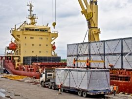 loading-cargo-into-the-ship-in-harbor-PF86726