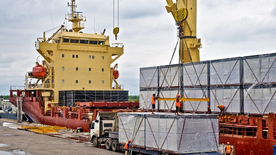 loading-cargo-into-the-ship-in-harbor-PF86726