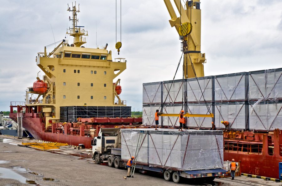 loading-cargo-into-the-ship-in-harbor-PF86726