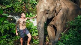 traveler-with-elephant-PYYEKQD