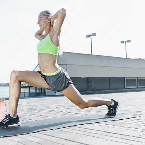 fit-fitness-woman-doing-stretching-exercises-SPE67T9