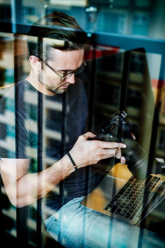 photographer-working-checking-photo-concept-PYTFP28