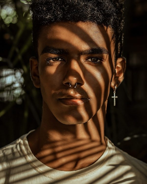 afro-earrings-guy-1977882