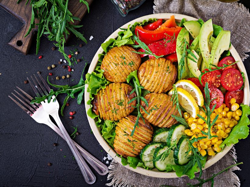 vegetarian-buddha-bowl-raw-vegetables-and-baked-KAYZM53