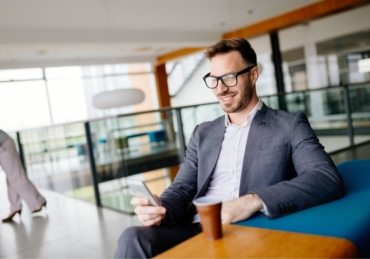businessman-taking-a-break-with-a-cup-of-coffee-JW4B3DH