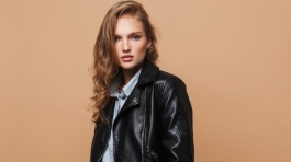 attractive-model-in-black-leather-jacket-intently-FUKRDTN