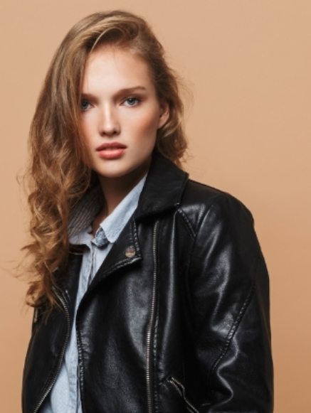 attractive-model-in-black-leather-jacket-intently-FUKRDTN