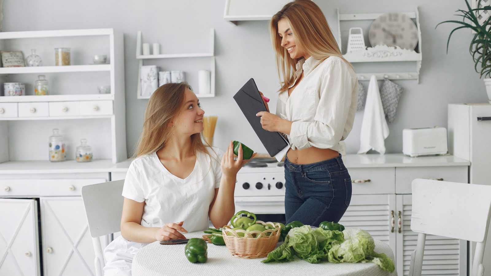 Healthy eating. Dieting and people concept. Blonde with a vegetable.