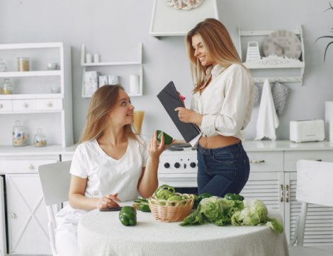Healthy eating. Dieting and people concept. Blonde with a vegetable.