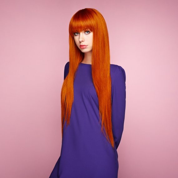 portrait-of-beautiful-woman-with-red-hair-P6XPFCE