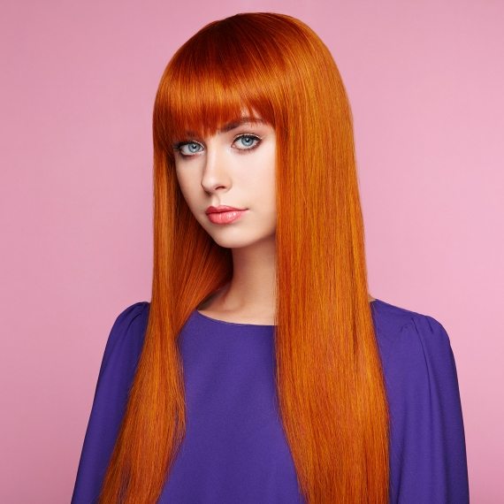 portrait-of-beautiful-woman-with-red-hair-PS5YVE6