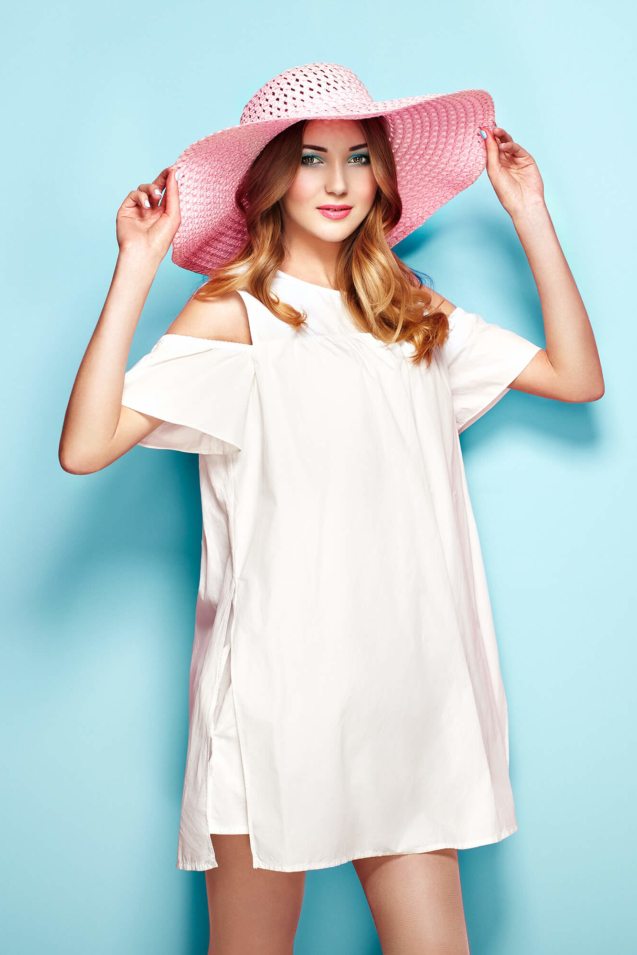 woman-in-summer-white-dress-P8TTMFV