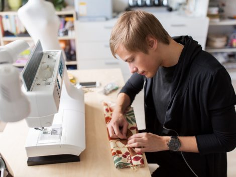 fashion-designer-with-making-dress-at-studio-P75Z6LP