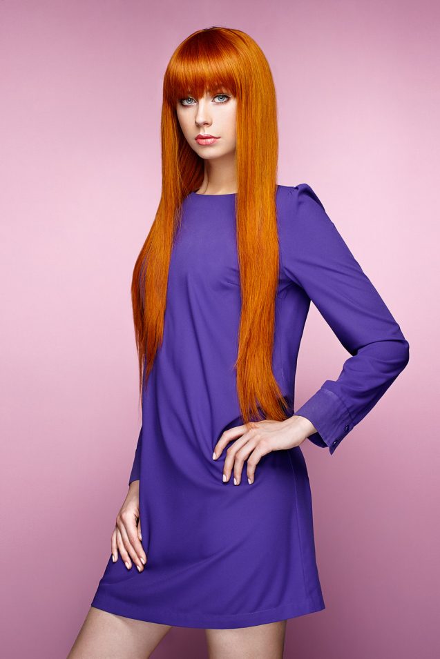 portrait-of-beautiful-woman-with-red-hair-PKXL45L