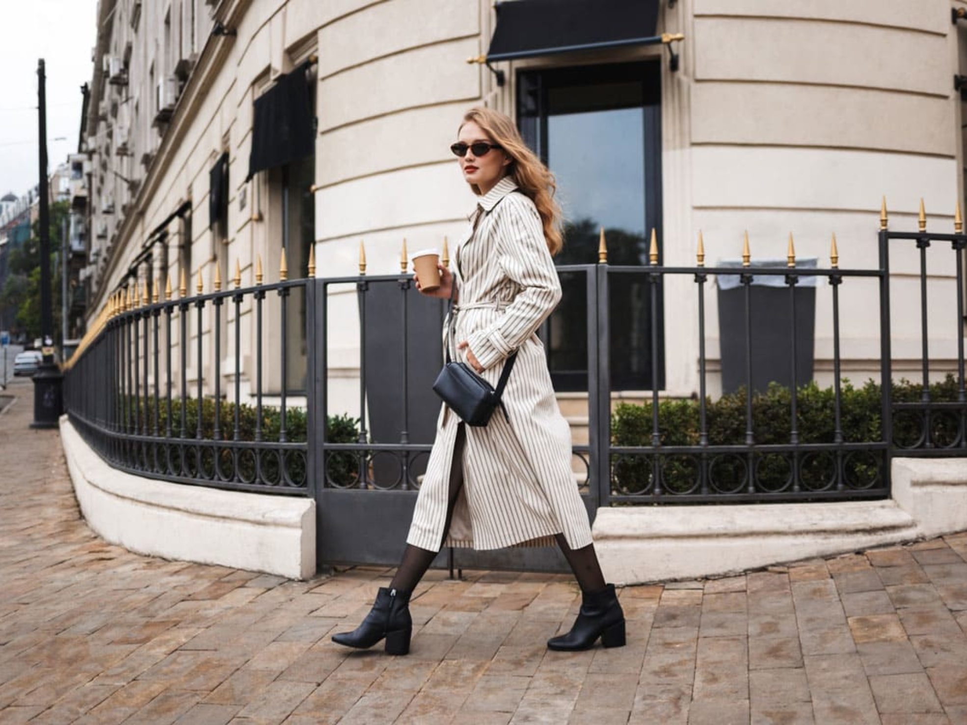 beautiful-girl-in-striped-trench-coat-and-X2AF7G8