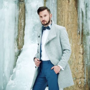 outdoor-portrait-of-handsome-man-in-gray-coat-PMQMEYH