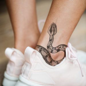 closeup-of-ankle-tattoo-of-a-woman-PJMLBNC(1)