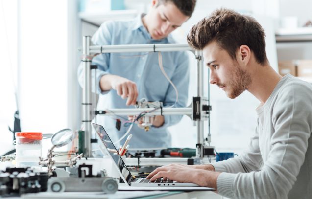 engineering-students-working-in-the-lab-PESV4KM